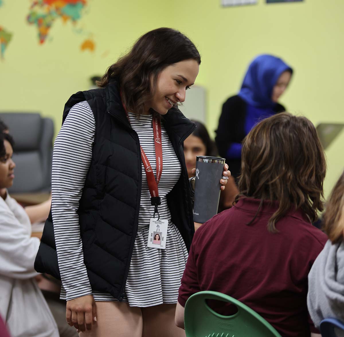 GSA St. Louis Middle Teacher and student interacting at a classroom desk